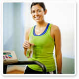Woman Drinking Water After Workout